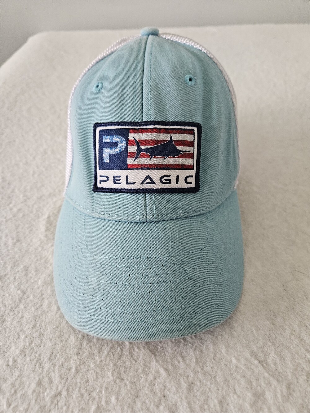 Pelagic Aqua and White Trucker Hat with Marlin Patch